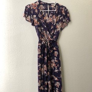 Floral jumpsuit with belt & pockets on both sides